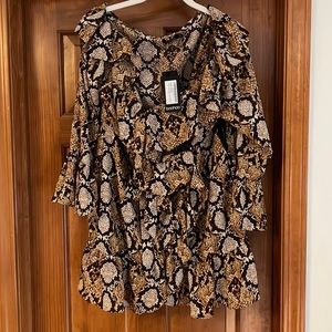 Women’s boohoo animal print, ruffle dress with tie waist. Extremely flattering.